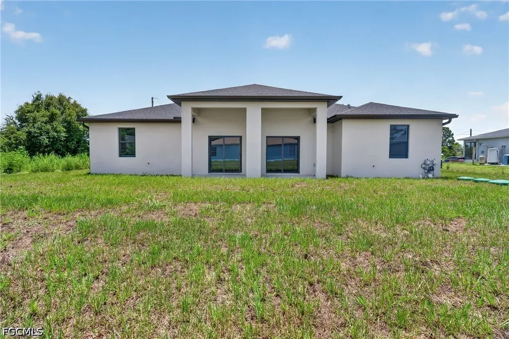 225/227 Ivan Avenue S Lehigh Acres FL 33973
