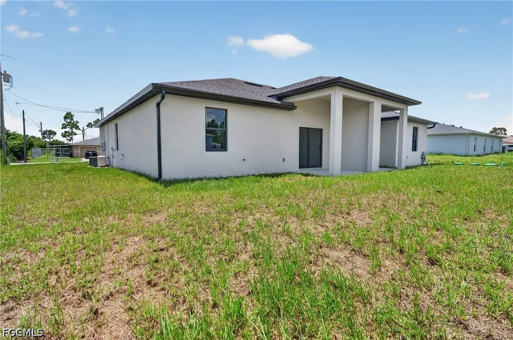 225/227 Ivan Avenue S Lehigh Acres FL 33973