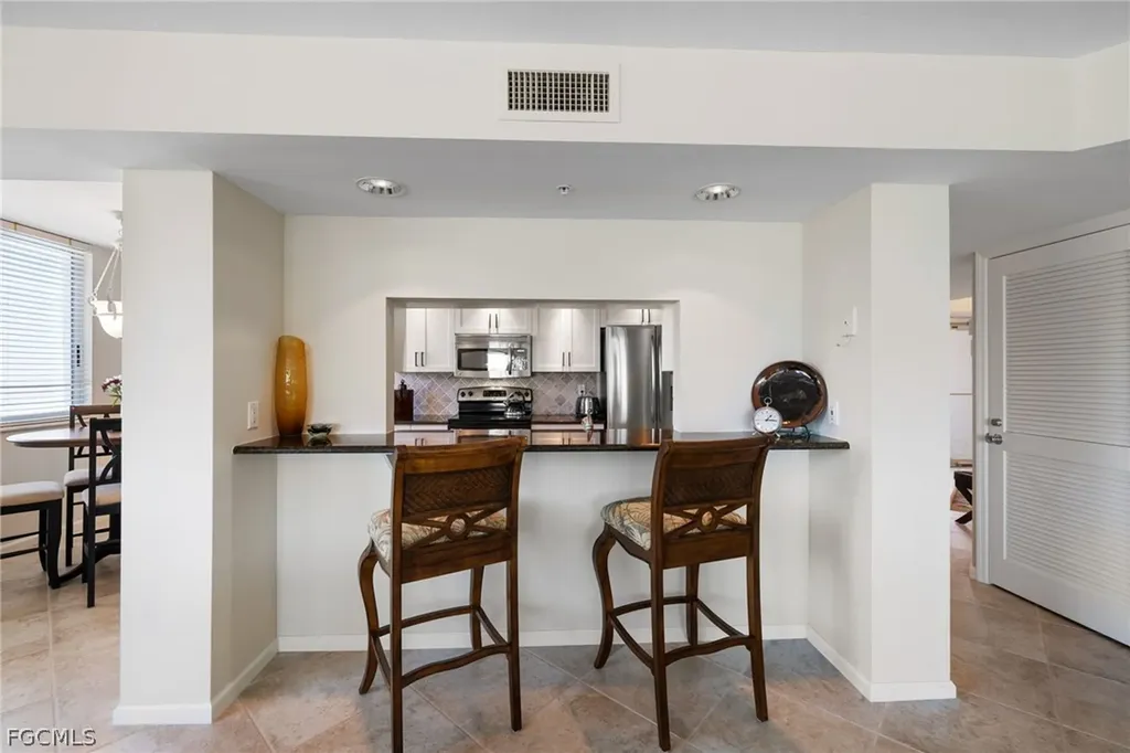 25 Bluebill Avenue Naples FL 34108