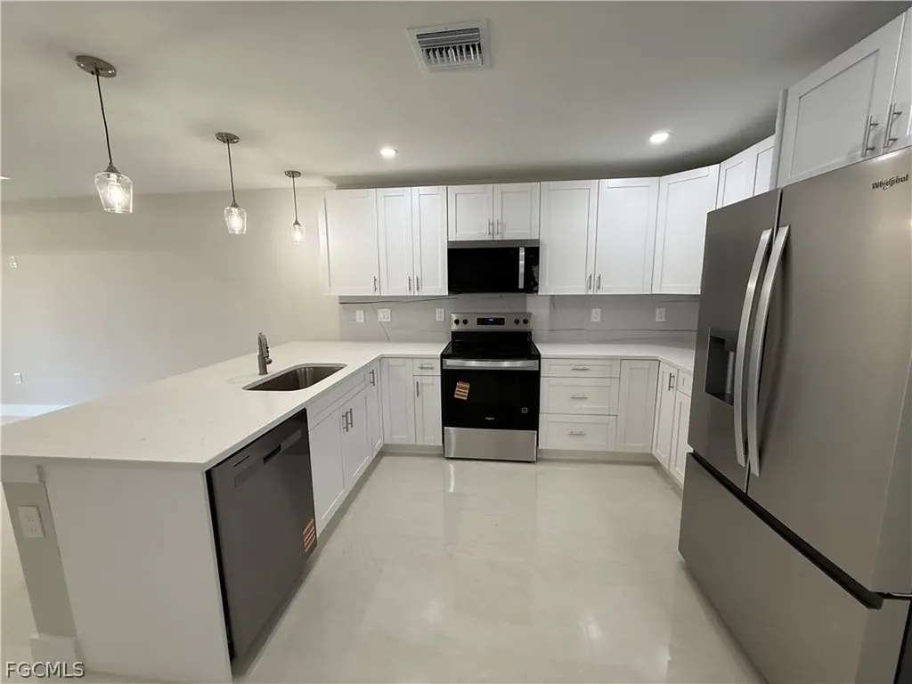 405-407 Chalet Avenue S Lehigh Acres FL 33974