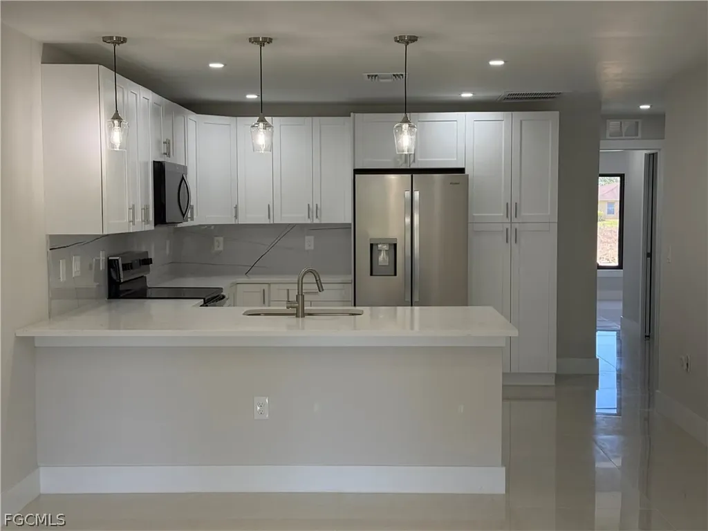 405-407 Chalet Avenue S Lehigh Acres FL 33974