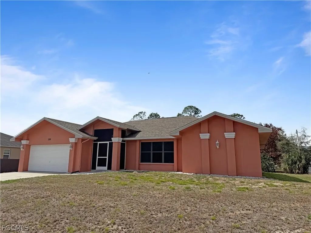 209 Mcarthur Avenue Lehigh Acres FL 33936