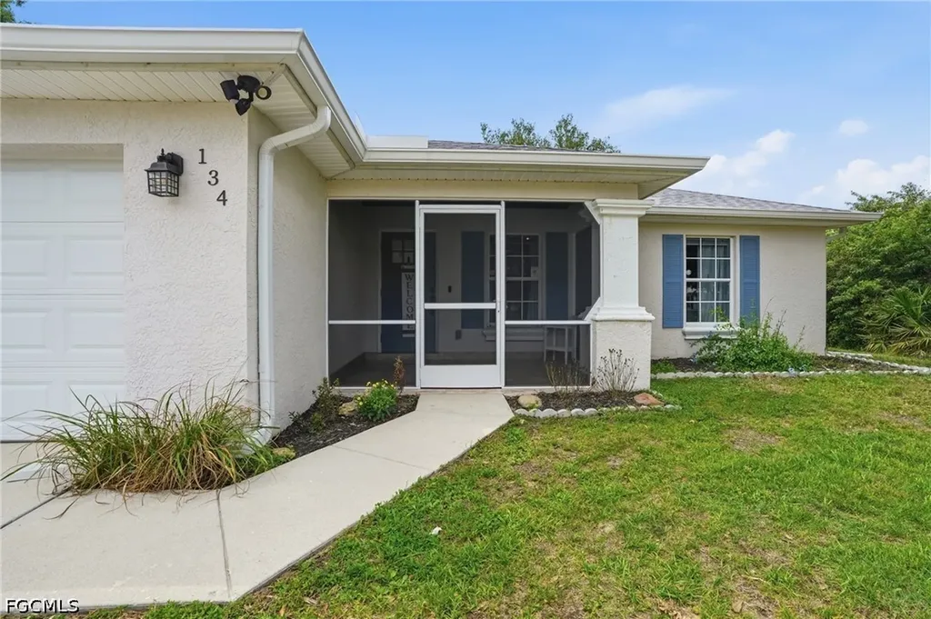 134 Mcarthur Boulevard Lehigh Acres FL 33974