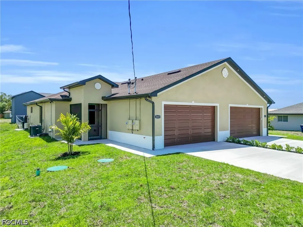 2625/2627 Sunniland Boulevard Lehigh Acres FL 33971