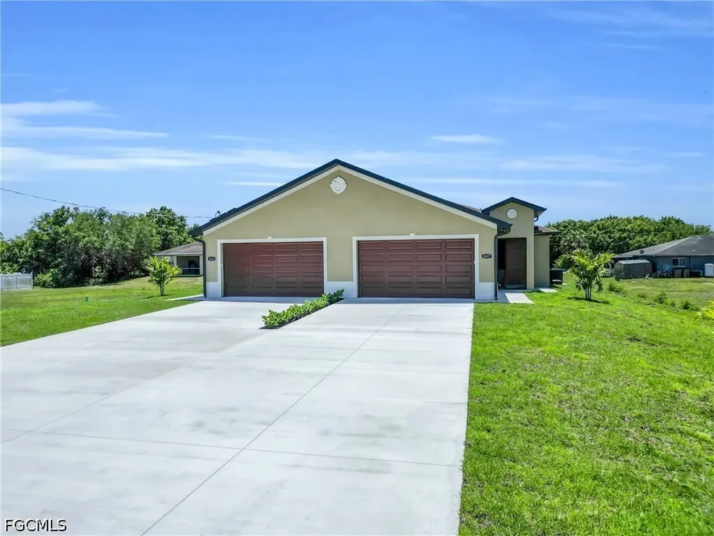 2625/2627 Sunniland Boulevard Lehigh Acres FL 33971