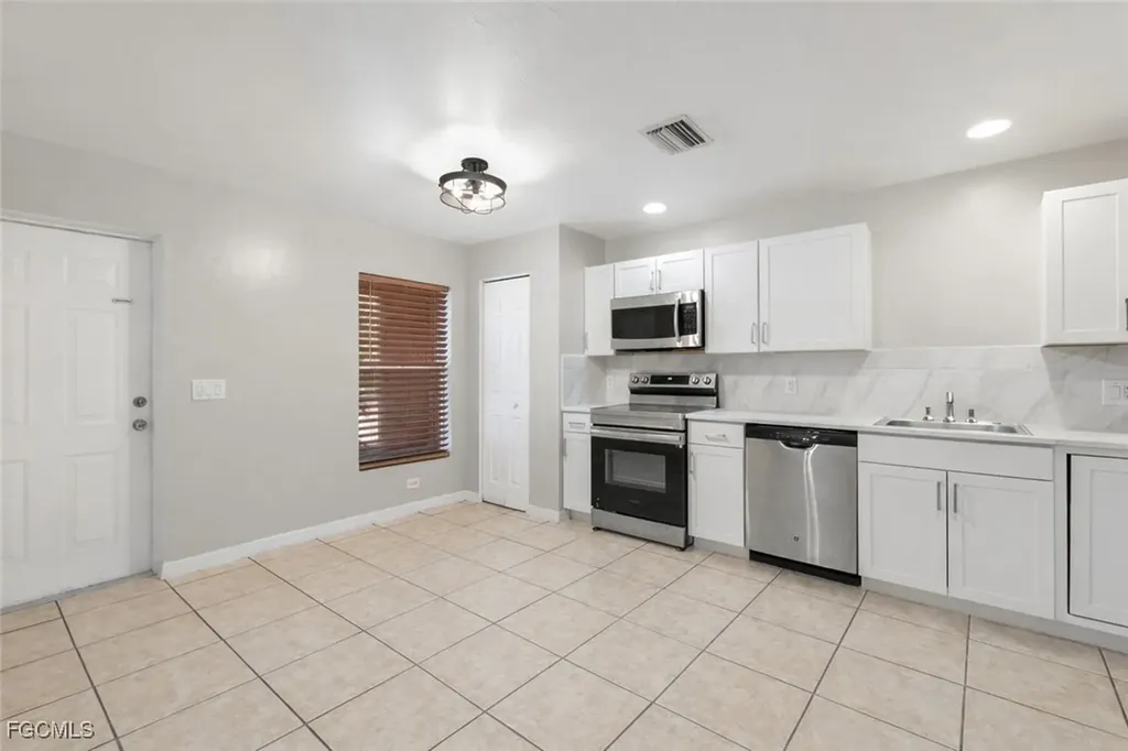 2405/2407 George Avenue S Lehigh Acres FL 33973