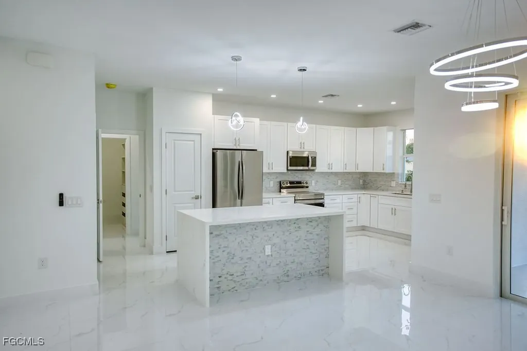 34 SE 23rd Place Cape Coral FL 33990