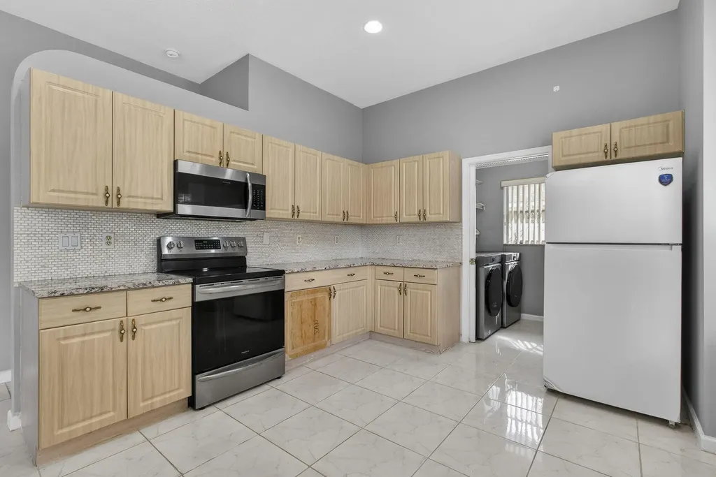102 Brook Woode Court Royal Palm Beach FL 33411