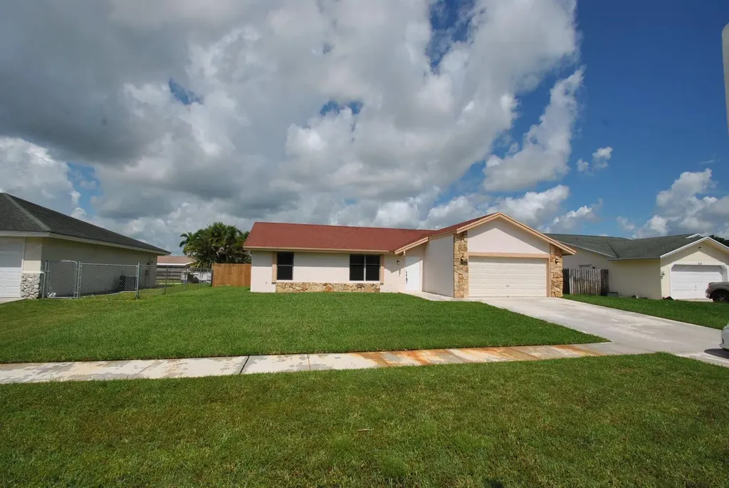310 La Mancha Avenue Royal Palm Beach FL 33411