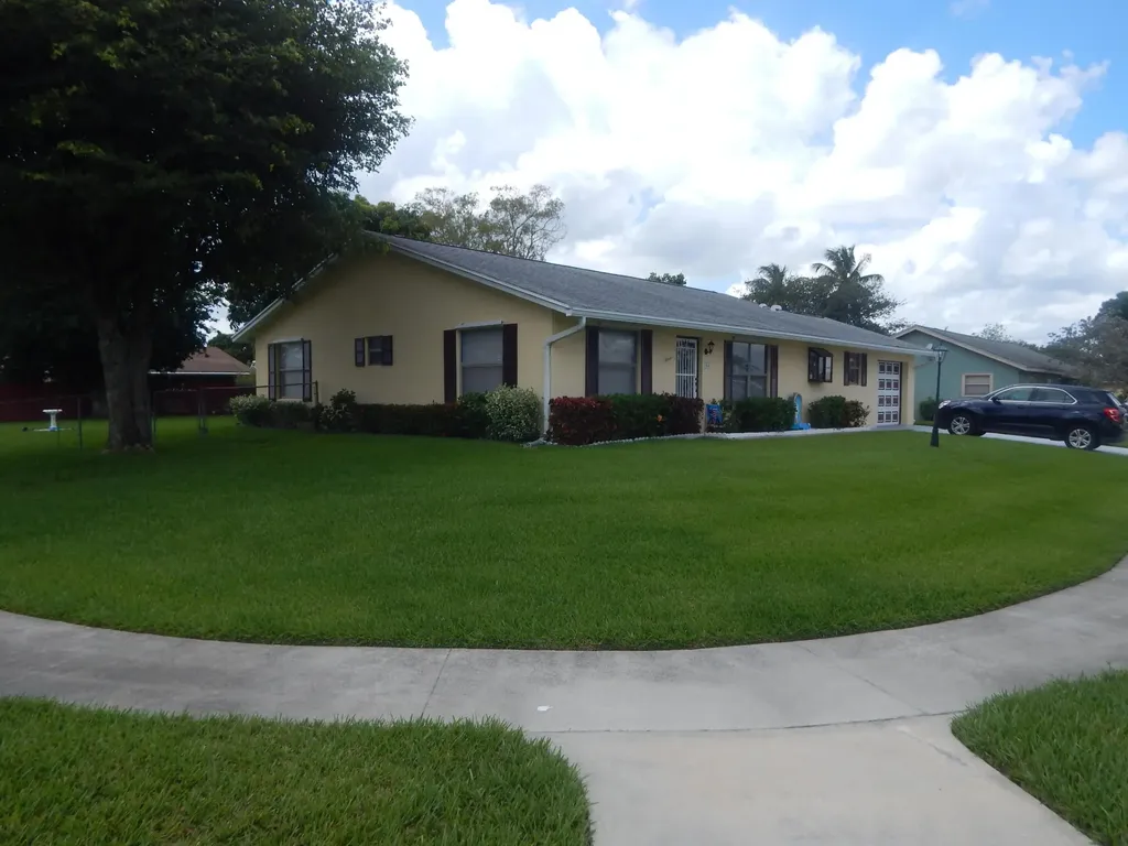104 La Mancha Avenue Royal Palm Beach FL 33411