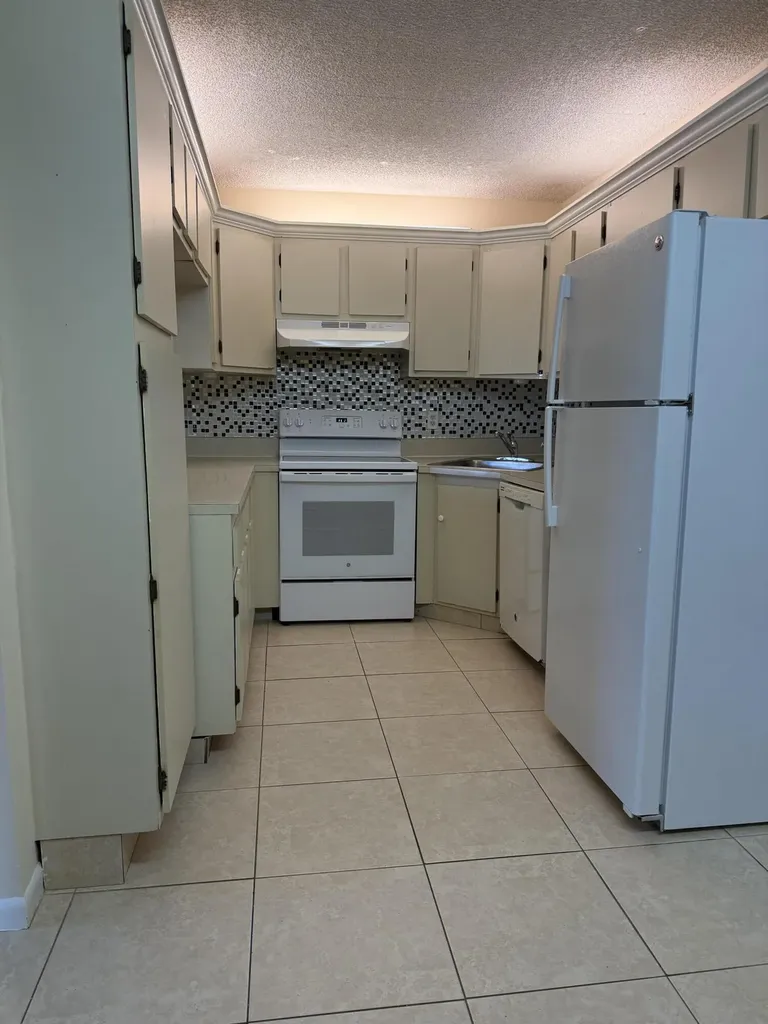 718 Sunny Pine Way Greenacres FL 33415