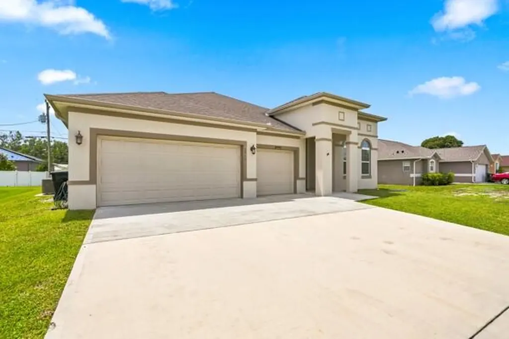 1957 SW Logan Street Port St Lucie FL 34953