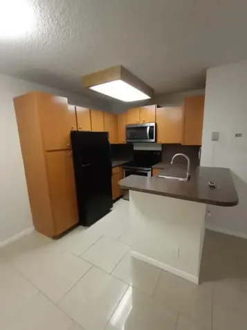 851 Lyons Road Coconut Creek FL 33063