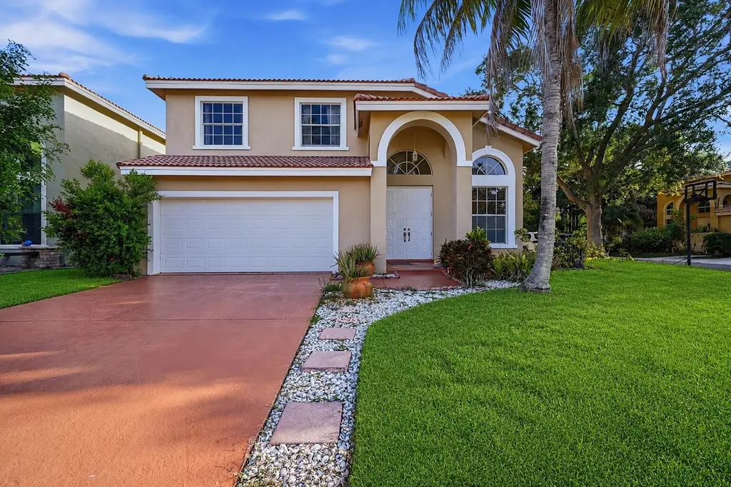 306 NW 115th Way Coral Springs FL 33071