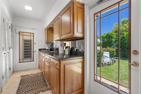 57 Cayuga Road Sea Ranch Lakes FL 33308