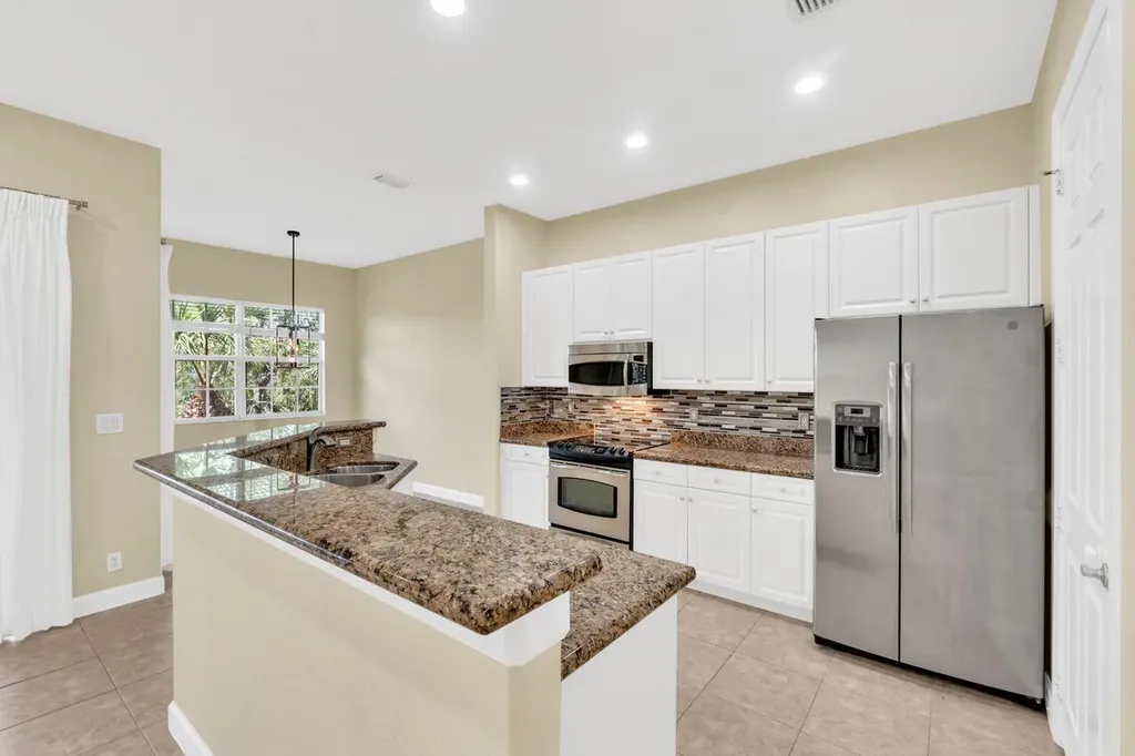 8035 NW 127th Lane Parkland FL 33076