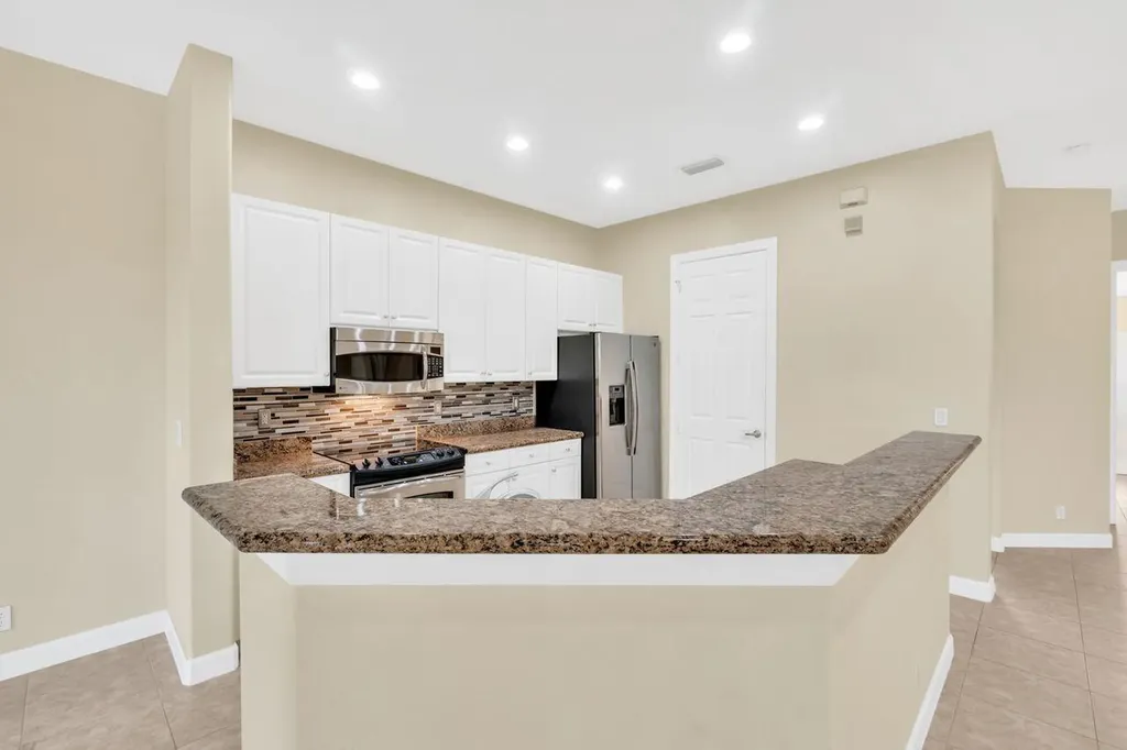 8035 NW 127th Lane Parkland FL 33076