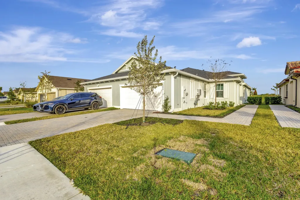 1254 Tangled Orchard Trace The Acreage FL 33470