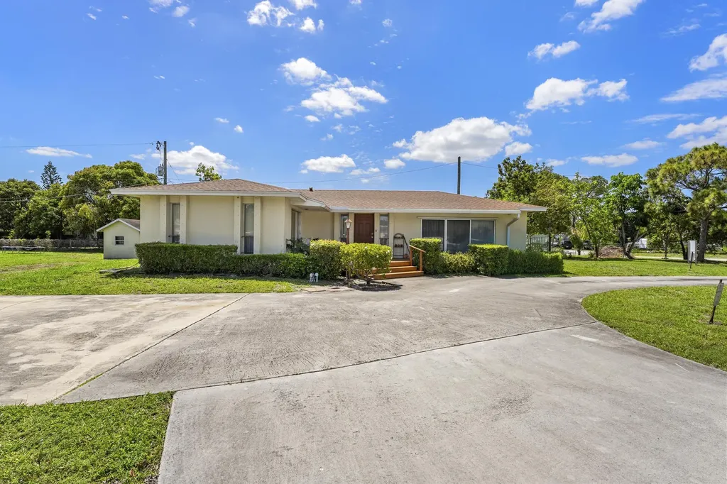 1675 E Breezy Lane West Palm Beach FL 33417