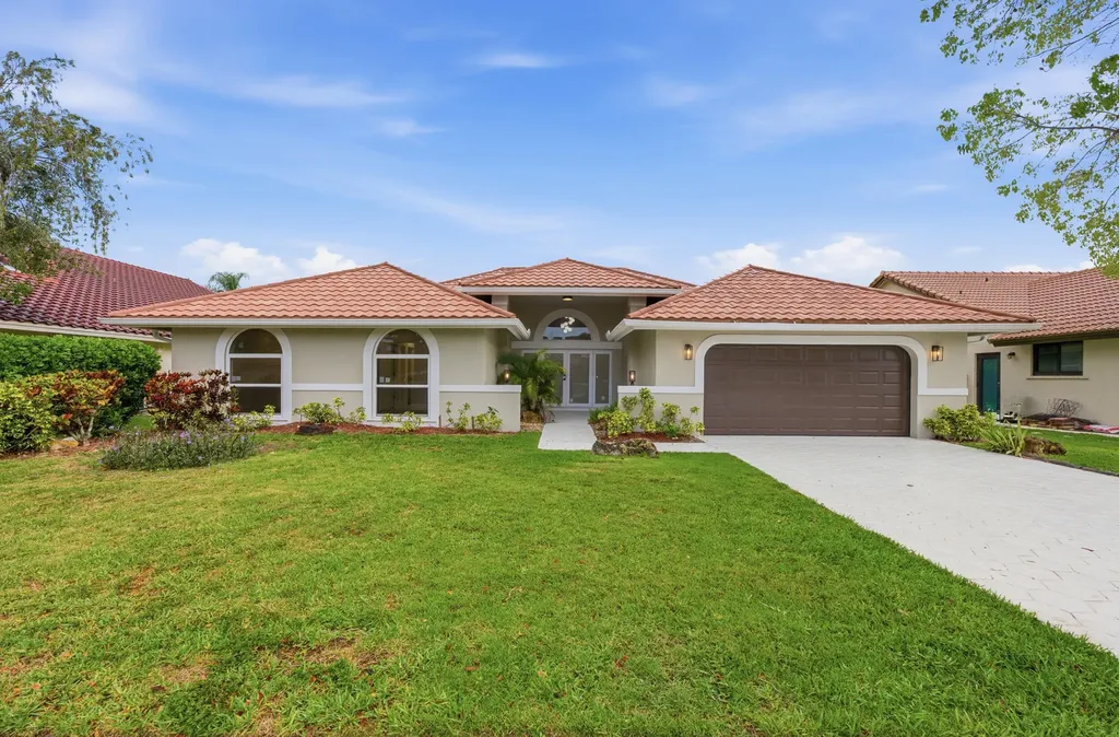 9677 N Springs Way Coral Springs FL 33076