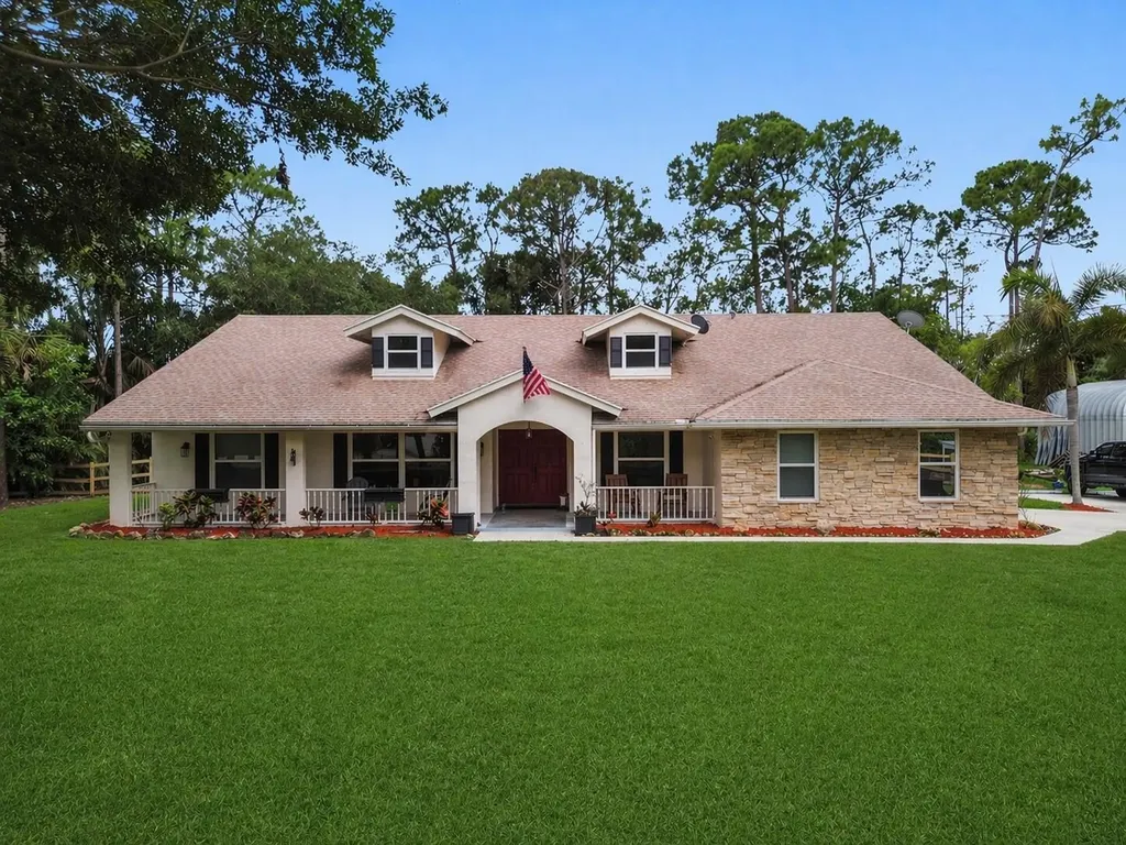 15590 N 77th Place N The Acreage FL 33470
