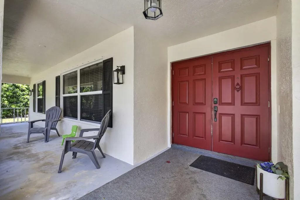 15590 N 77th Place N The Acreage FL 33470