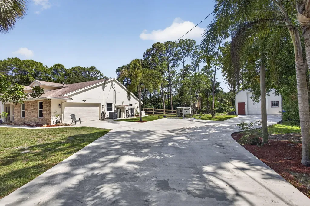 15590 N 77th Place N The Acreage FL 33470