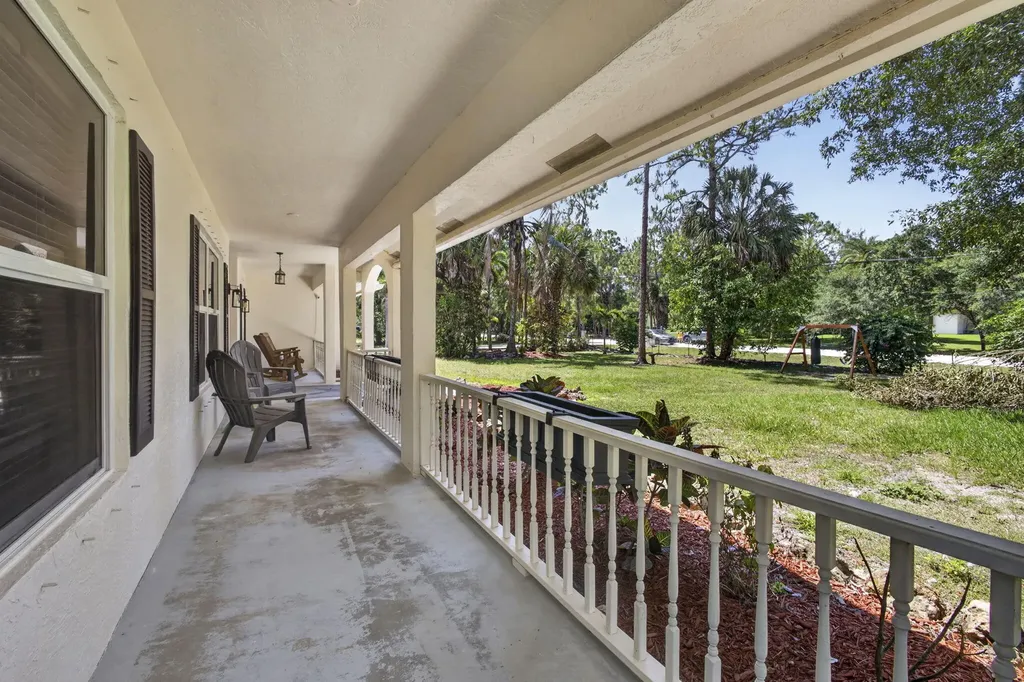 15590 N 77th Place N The Acreage FL 33470