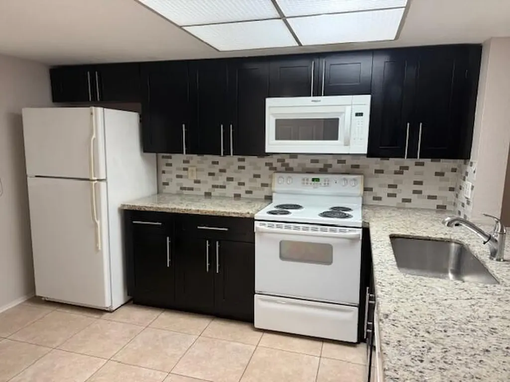 104 N Palm Beach Trace Drive Royal Palm Beach FL 33411