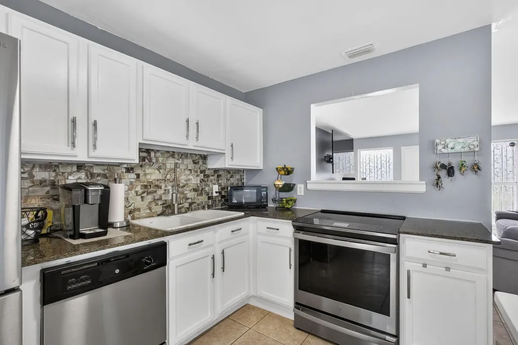 9141 Birmingham Drive Palm Beach Gardens FL 33410