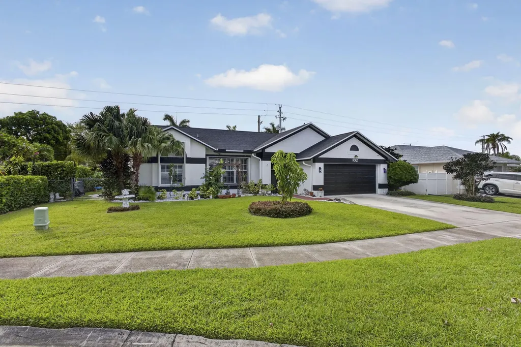 102 E Royal Pine Circle Court Royal Palm Beach FL 33411