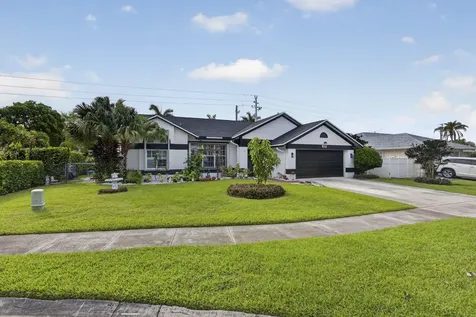 102 E Royal Pine Circle Court Royal Palm Beach FL 33411