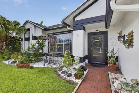 102 E Royal Pine Circle Court Royal Palm Beach FL 33411