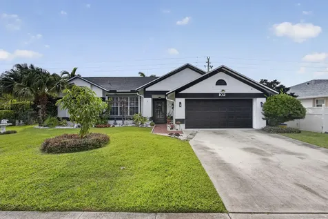 102 E Royal Pine Circle Court Royal Palm Beach FL 33411