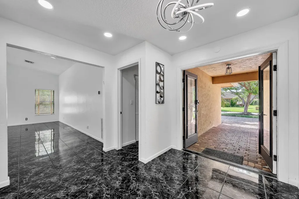 303 NW 105th Terrace Coral Springs FL 33071