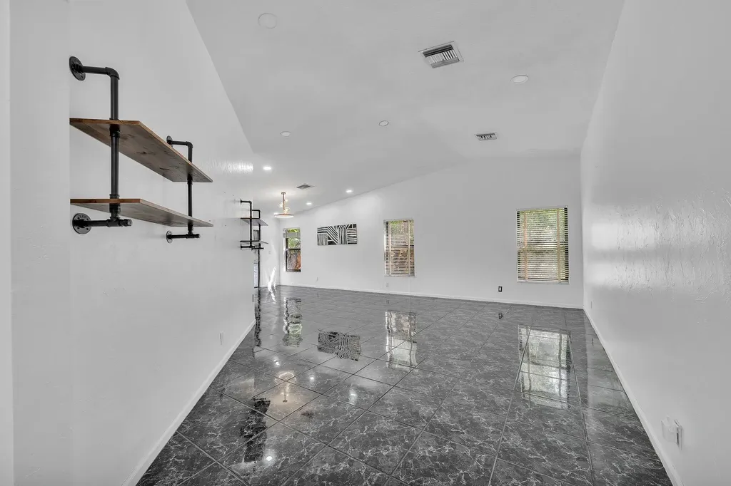 303 NW 105th Terrace Coral Springs FL 33071