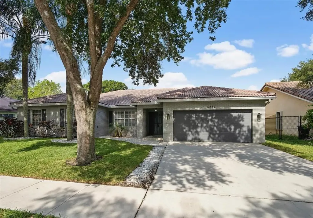 5883 NW 41st Lane Coconut Creek FL 33073