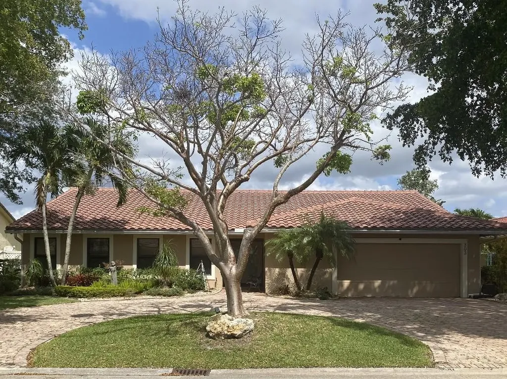 303 NW 105th Terrace Coral Springs FL 33071