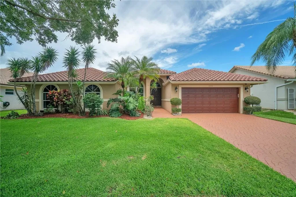 4966 NW 100th Terrace Coral Springs FL 33076