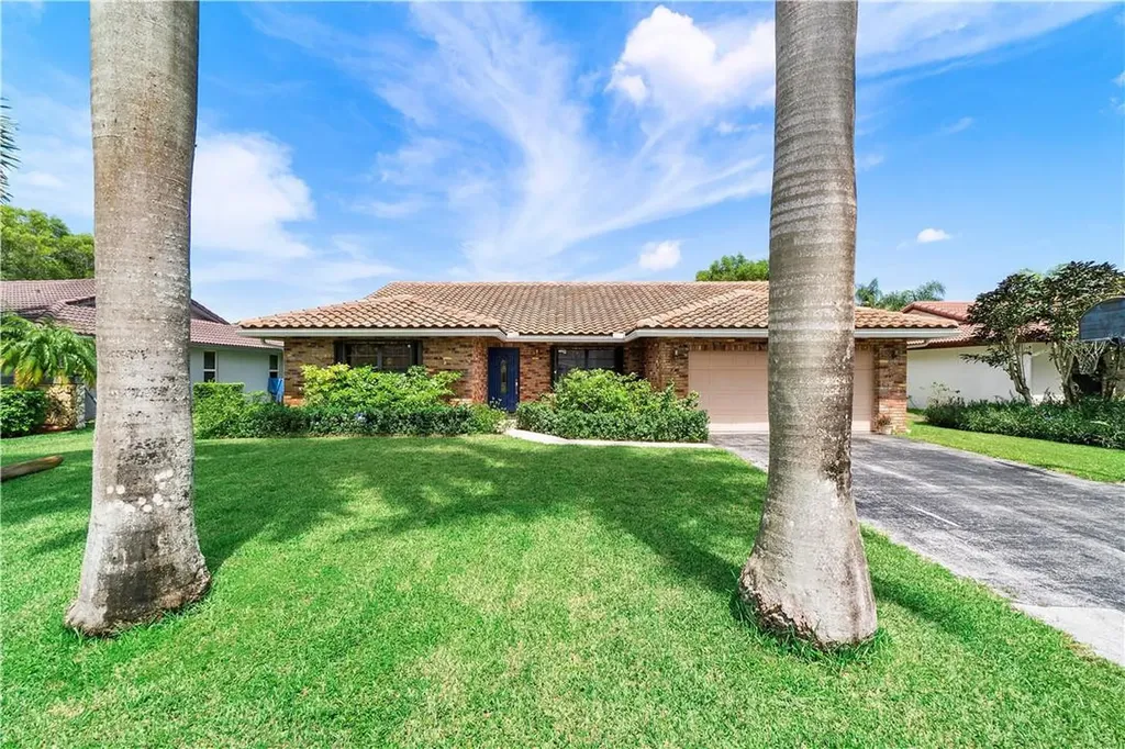 303 NW 107th Terrace Coral Springs FL 33071
