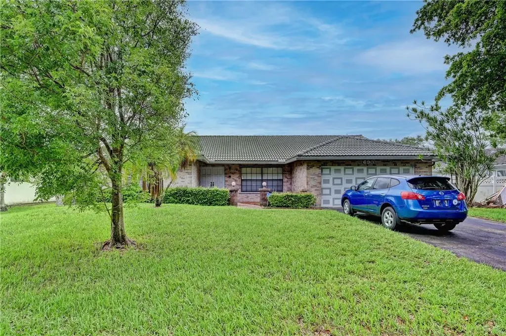 690 NW 109th Terrace Coral Springs FL 33071