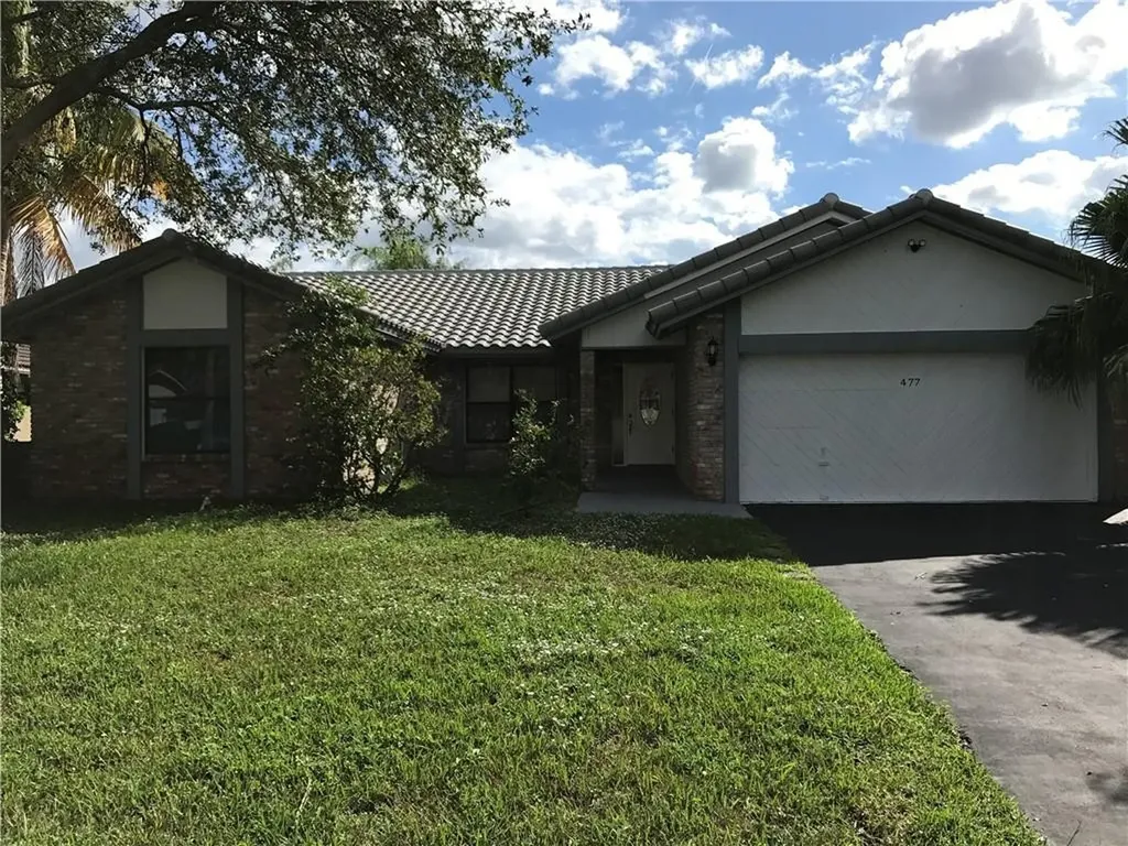 477 NW 113th Terrace Coral Springs FL 33071