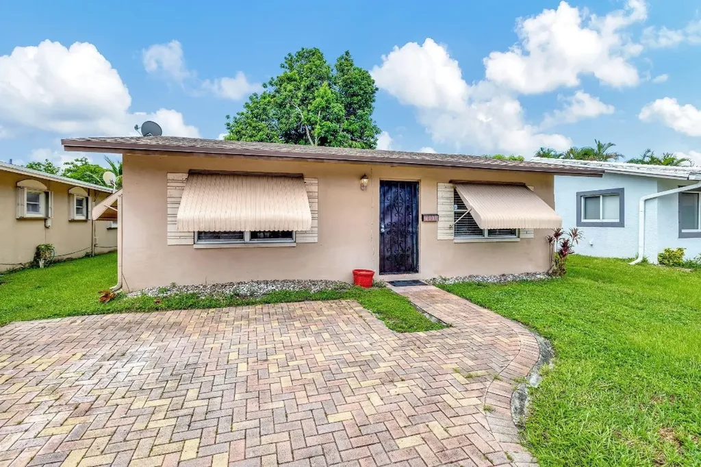 6103 NW 73rd Terrace Tamarac FL 33321