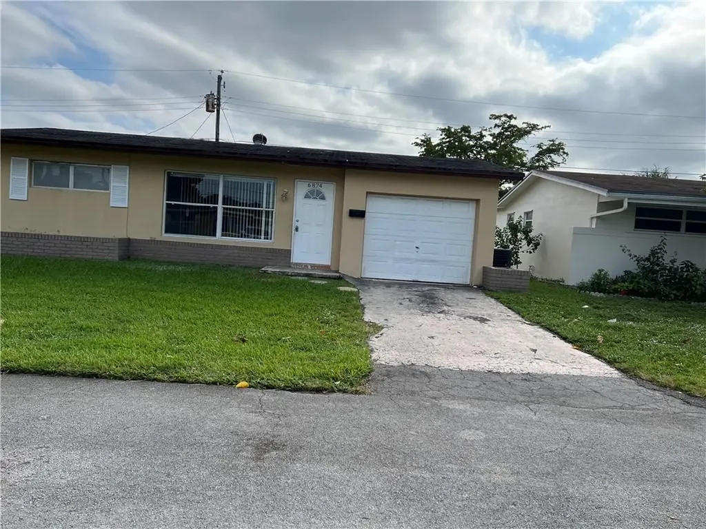 6874 NW 27th Court Sunrise FL 33313