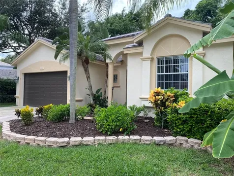 6001 NW Swans Way Coconut Creek FL 33073