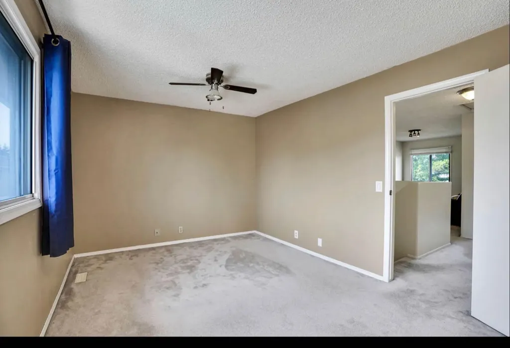 164 Woodsman Lane Calgary AB T2W 4Z6