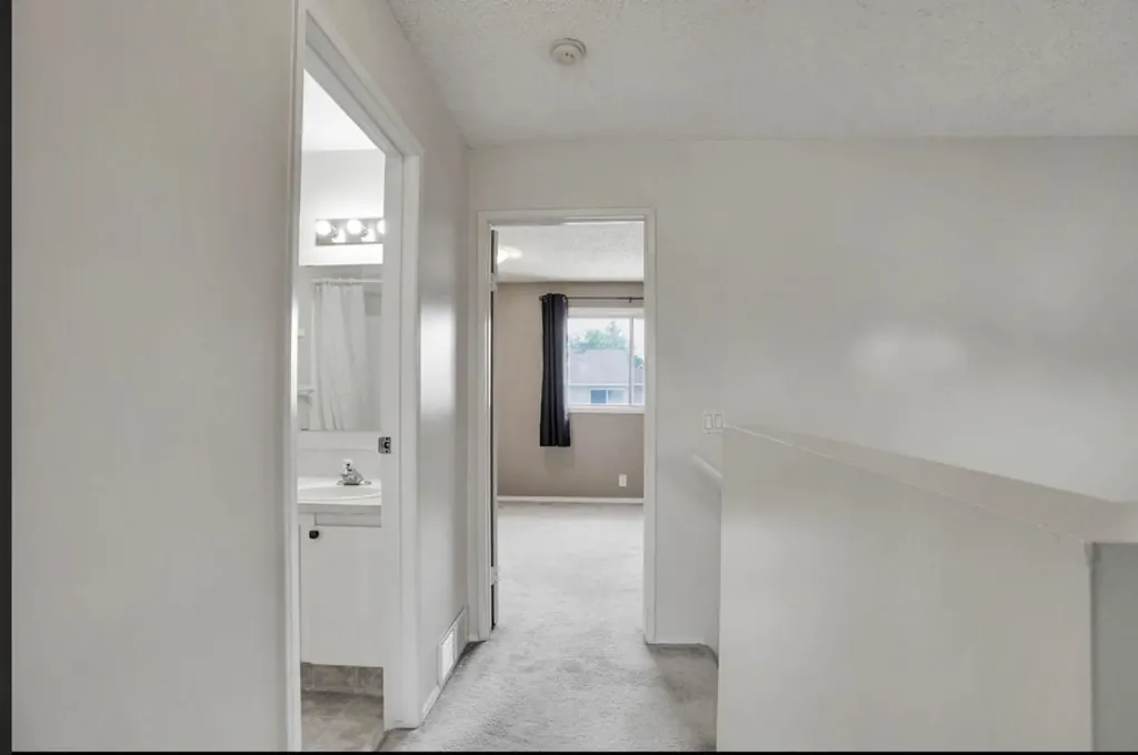 164 Woodsman Lane Calgary AB T2W 4Z6