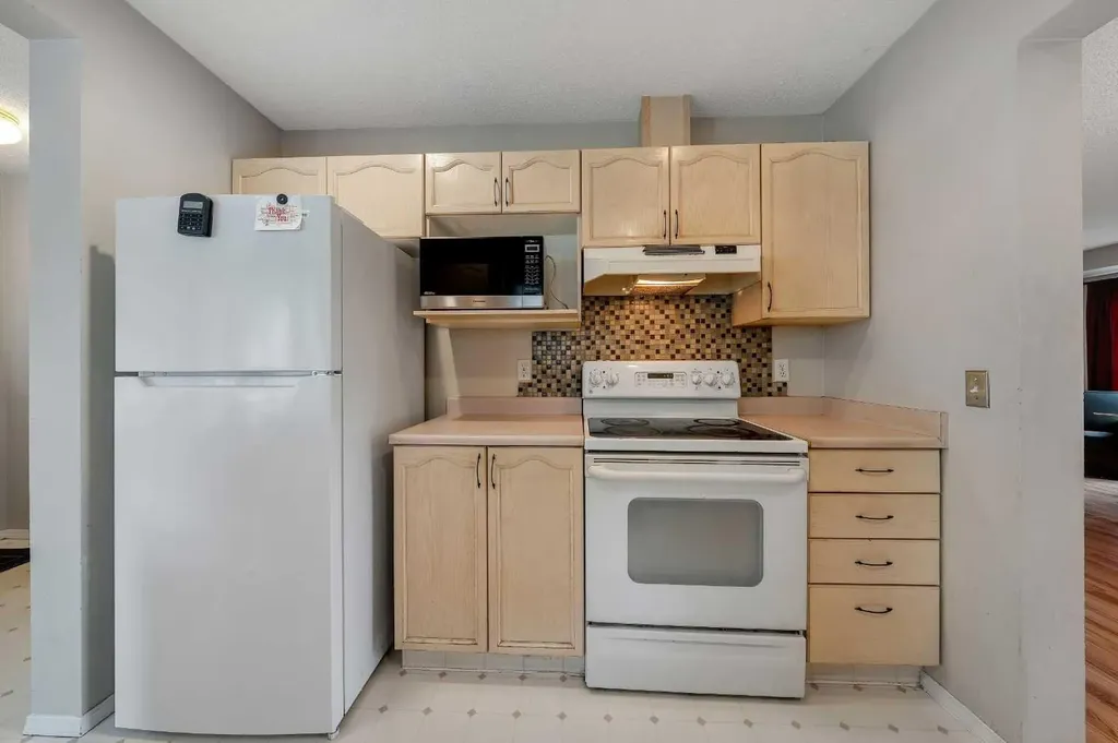 388 Sandarac Drive NW Calgary AB T3K 4E3