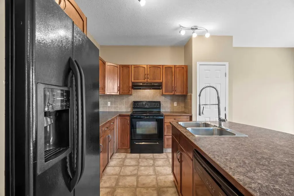 391 Cimarron Boulevard Okotoks AB T1S 0A9