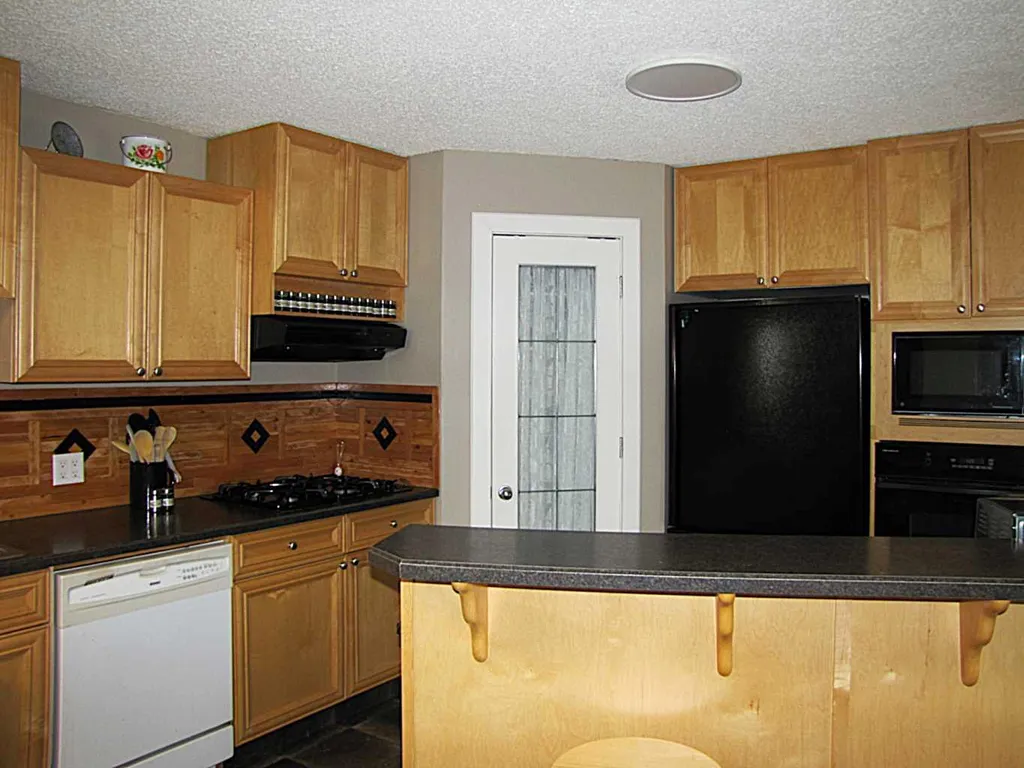 4923 52 Avenue Taber AB T1G 1H6